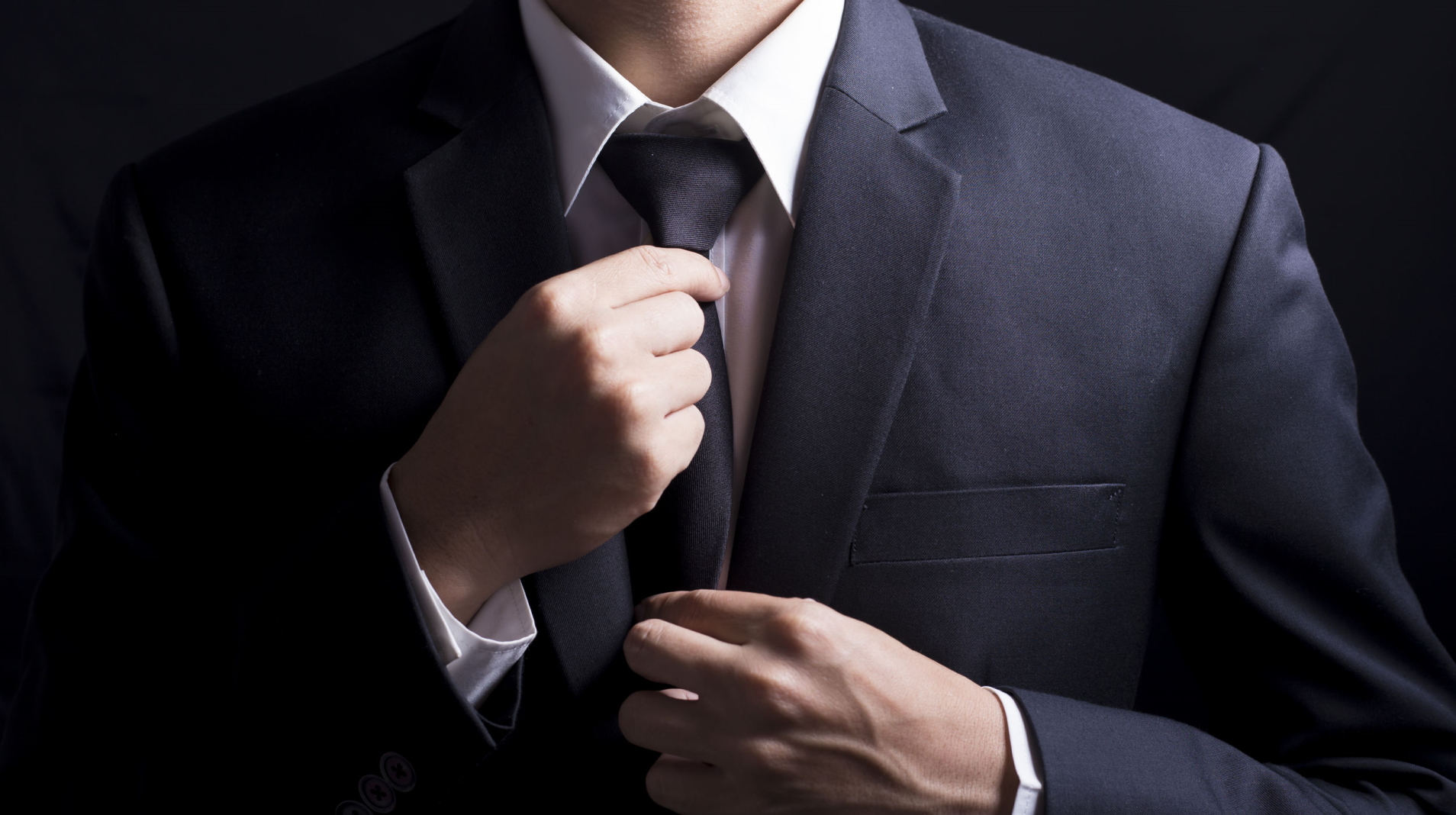 Businessman Adjust Necktie his Suit - Lead Change